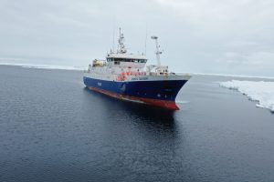 The Antarctic Discovery, certified to BSP's Responsible Fishing Vessel Standard, out fishing amongst ice and snow.