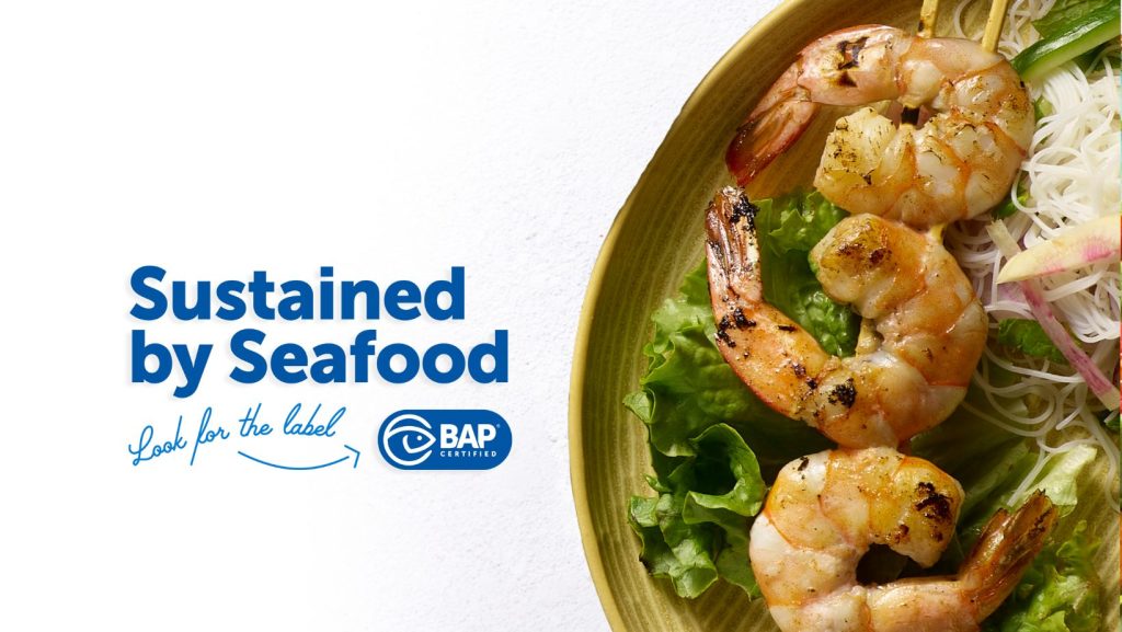 Photo of new BAP summer recipe, Grilled Shrimp Lettuce Wraps, for Ocean Month with "Sustained by Seafood" graphic and reminder to look for the Best Aquaculture Practices label.