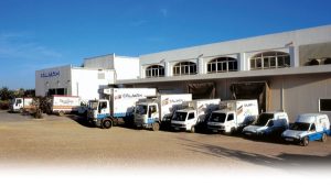 Calimax trucks docked outside the building in Spain